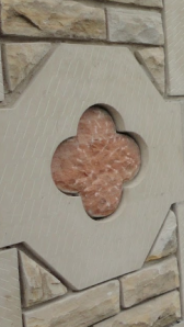 Detail of the 4 petal rose symbol" seen around Parliament, including the door handles.