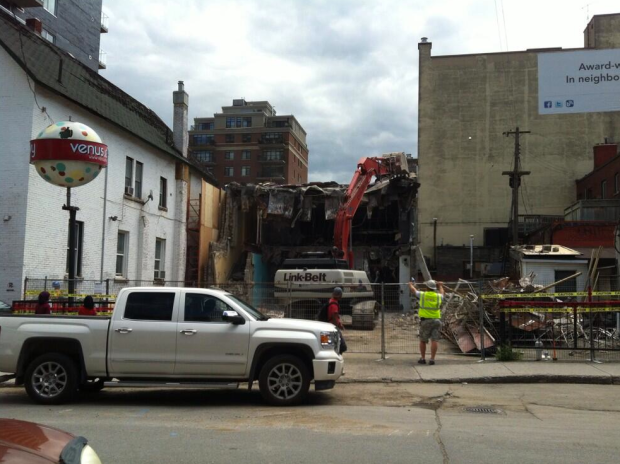 On July 4th the old Norge Village Laundromat and former Venus Envy store was demolished and the rare and iconic was lost with it. (photo via Twitter @venusenvyottawa)