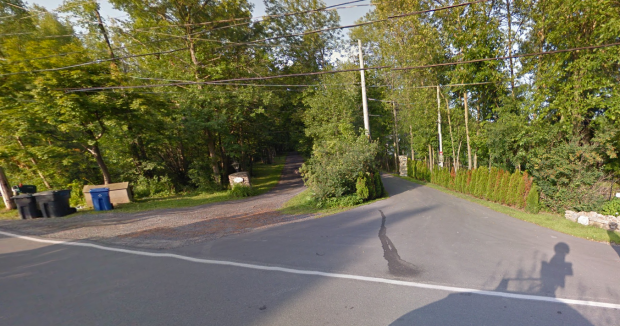 Google streetview showing the entrance to the private residence where the fortress sits in their backyard.