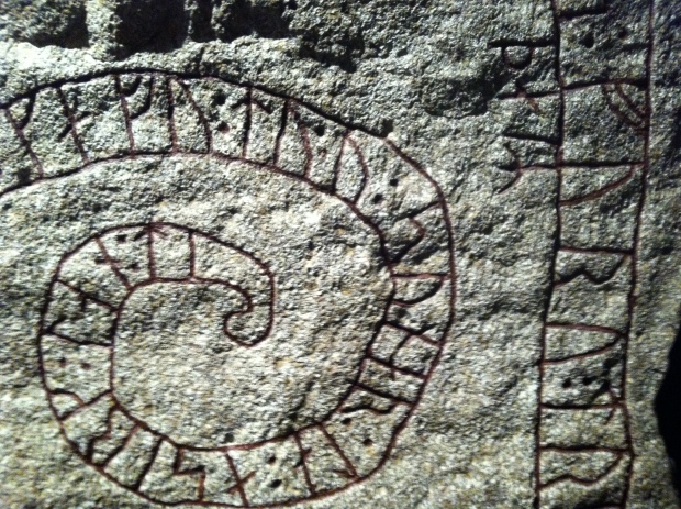 Viking rune stone inscribed with Norse writing.